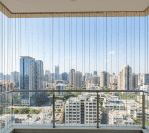 Invisible grills installed by Srinook Ambika Safety Grills for Homes & Buildings